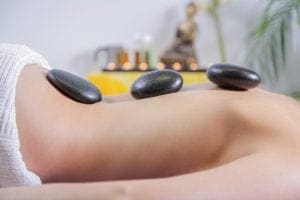 woman's body having a chinese medicine massage